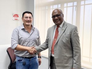 Fiji Deputy Prime Minister Hon Manoa Kamikamica congratulates Zane Yoshida on his election as AFBC President during a recent visit to Suva. Pic: Dev Nadkarni.